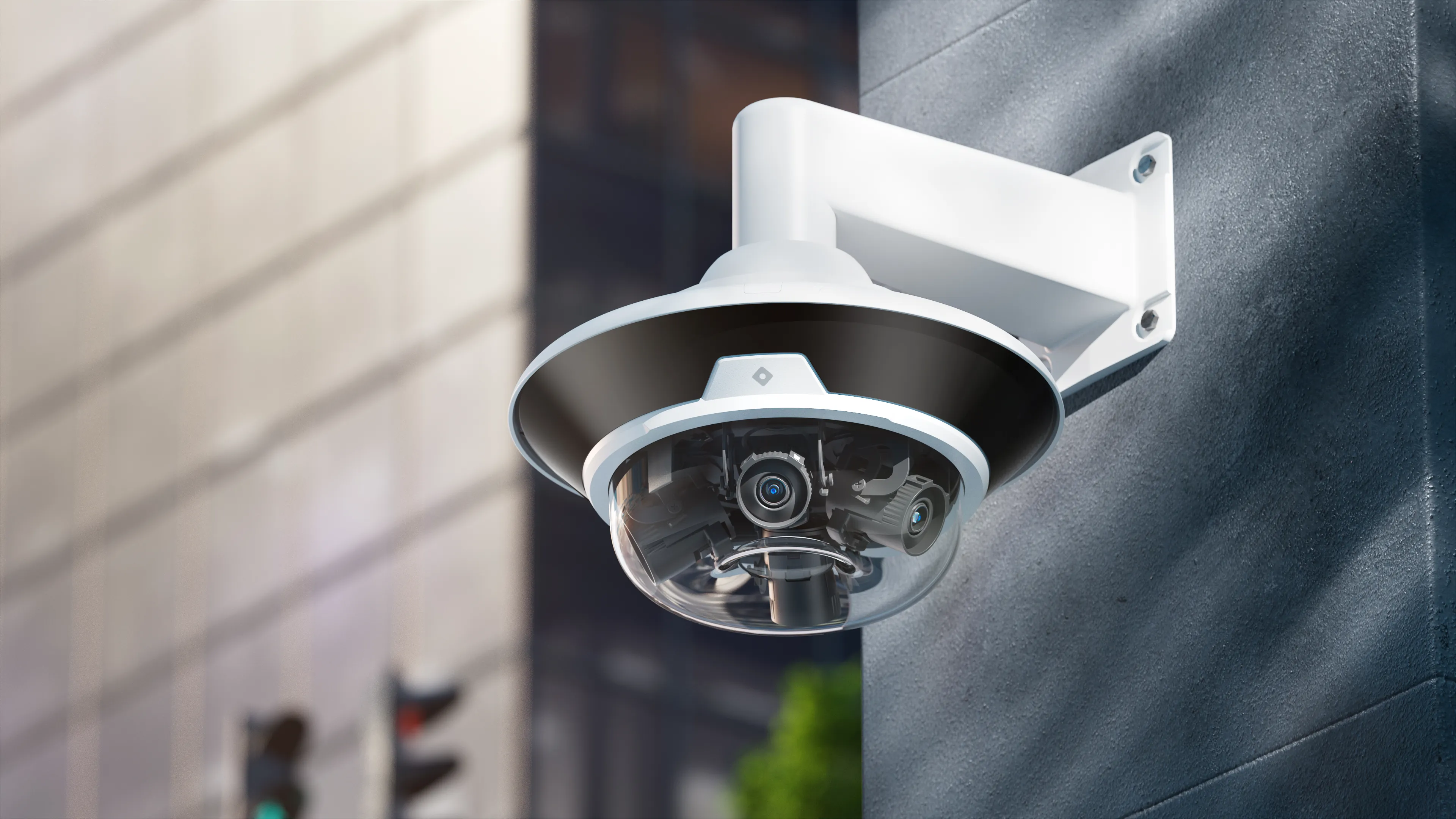 Northwall multi-sensor dome camera mounted on a commercial building overlooking the city